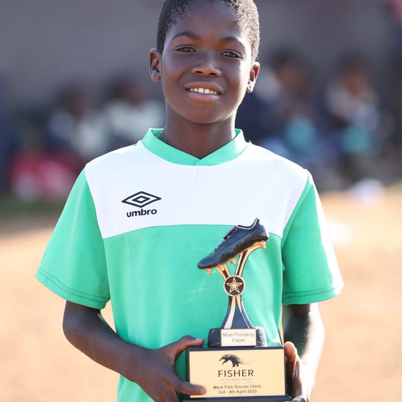 Seventy five children from the Mthekwini community and coaches from the Hluhluwe district attended the Mark Fish Coaching Clinic which was held in conjunction with the borehole activation near the Izintambane School in the Mthekwini community. Young Mpendulo Vavi won the trophy for the Most Promising Player.